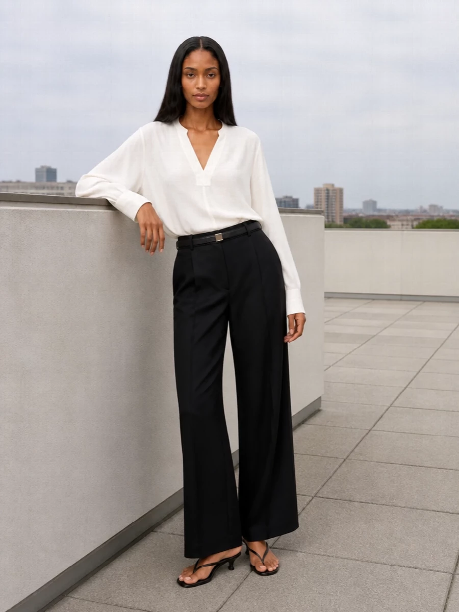 Toteme black wide leg trousers ivory blouse outfit
