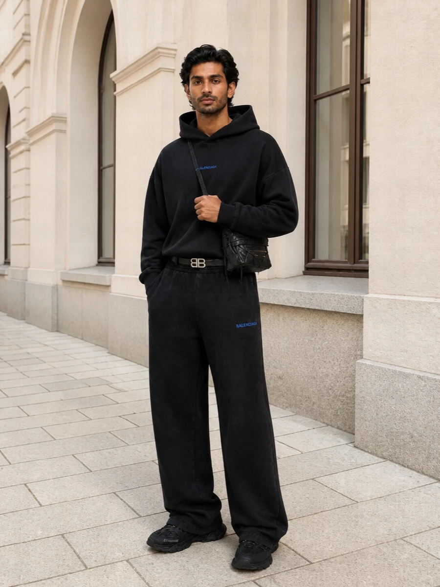 Balenciaga black wide leg track pant hoodie outfit