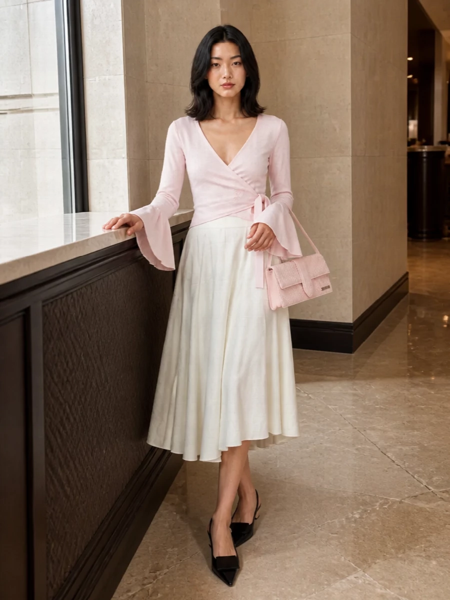 Jacquemus blush wrap top ivory midi skirt outfit