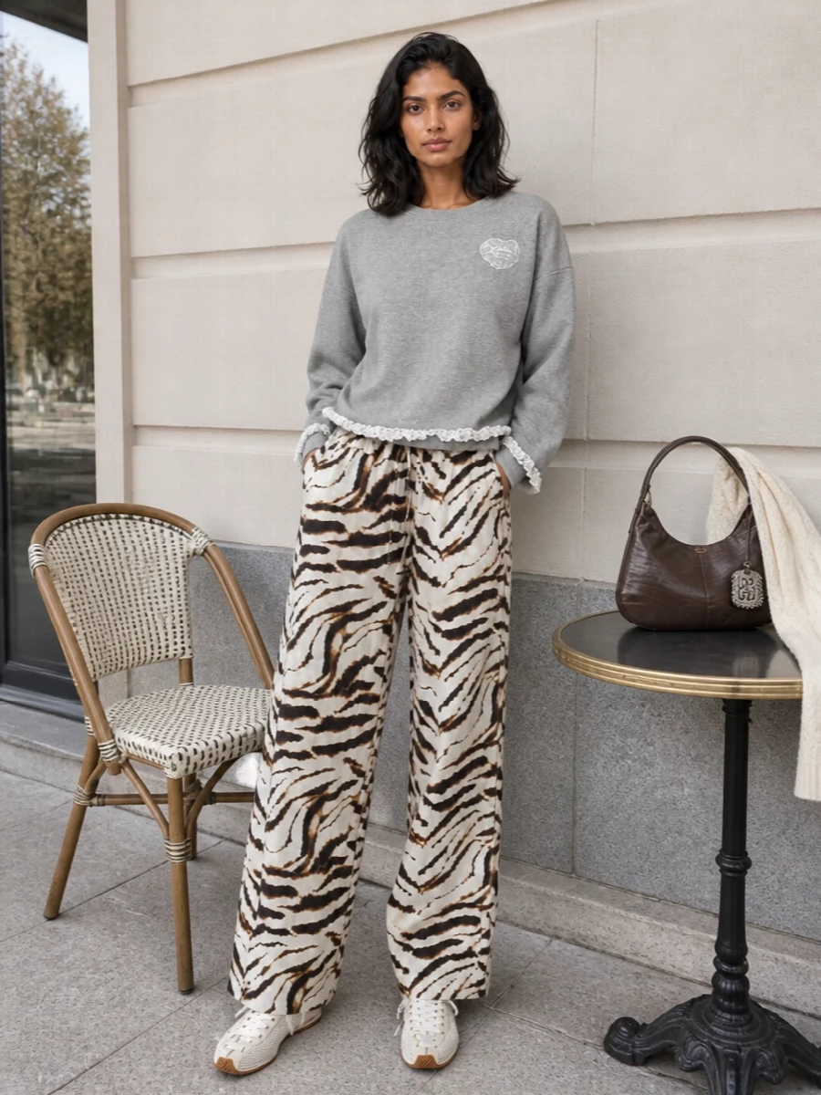 Ganni tiger pants grey sweatshirt outfit