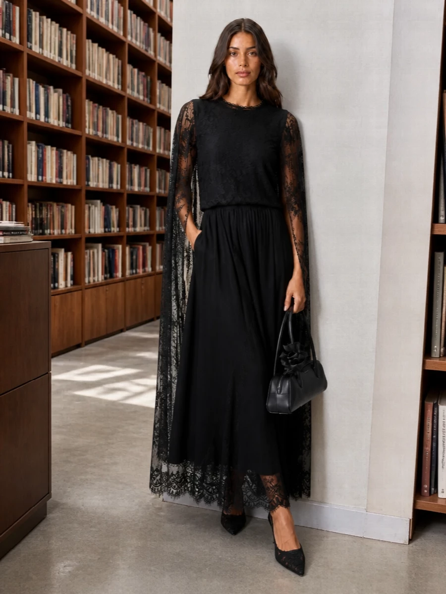 Zimmermann black lace cape maxi dress outfit