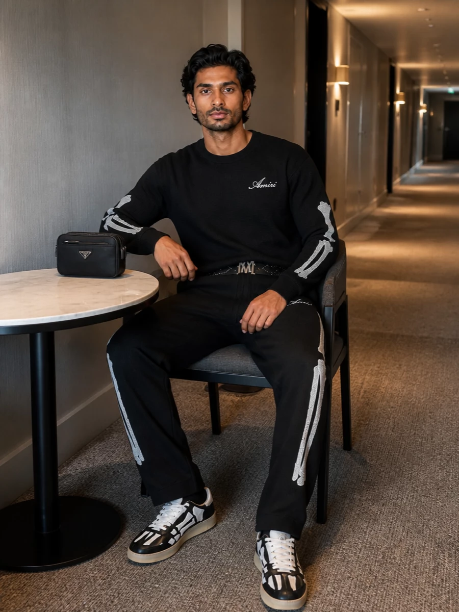 Amiri skeleton track pants prada belt bag outfit