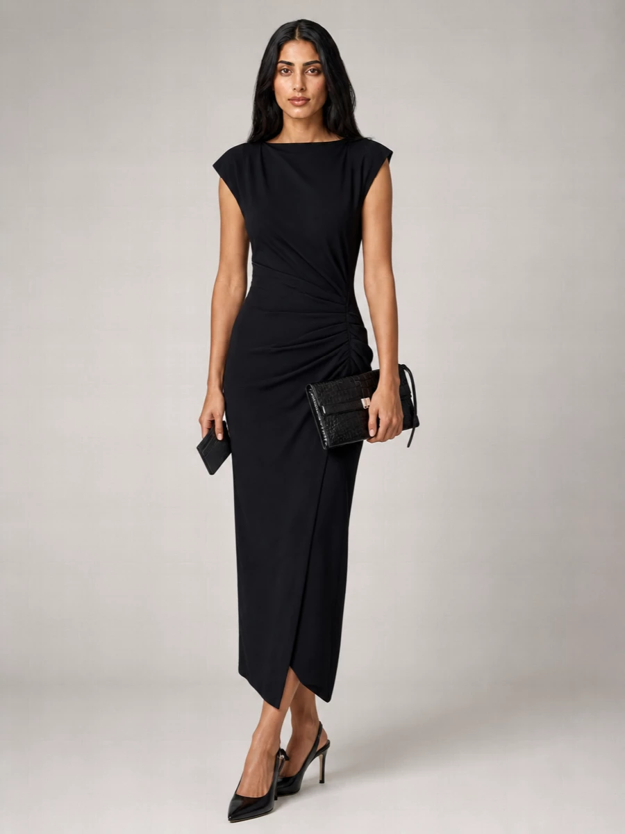 I chose the dress route to keep the outfit pared-back and columnar, echoing the slim, structured Vivienne Westwood cardholder in a single, uninterrupted black line. The Isabel Marant midi, sharp slingback heel and Totême clutch create a modern cocktail ensemble that feels quietly confident rather than showy, with subtle drape and texture doing the work. Black and silver details tie the accessories together so the whole reads as considered, urban and discreetly luxurious.