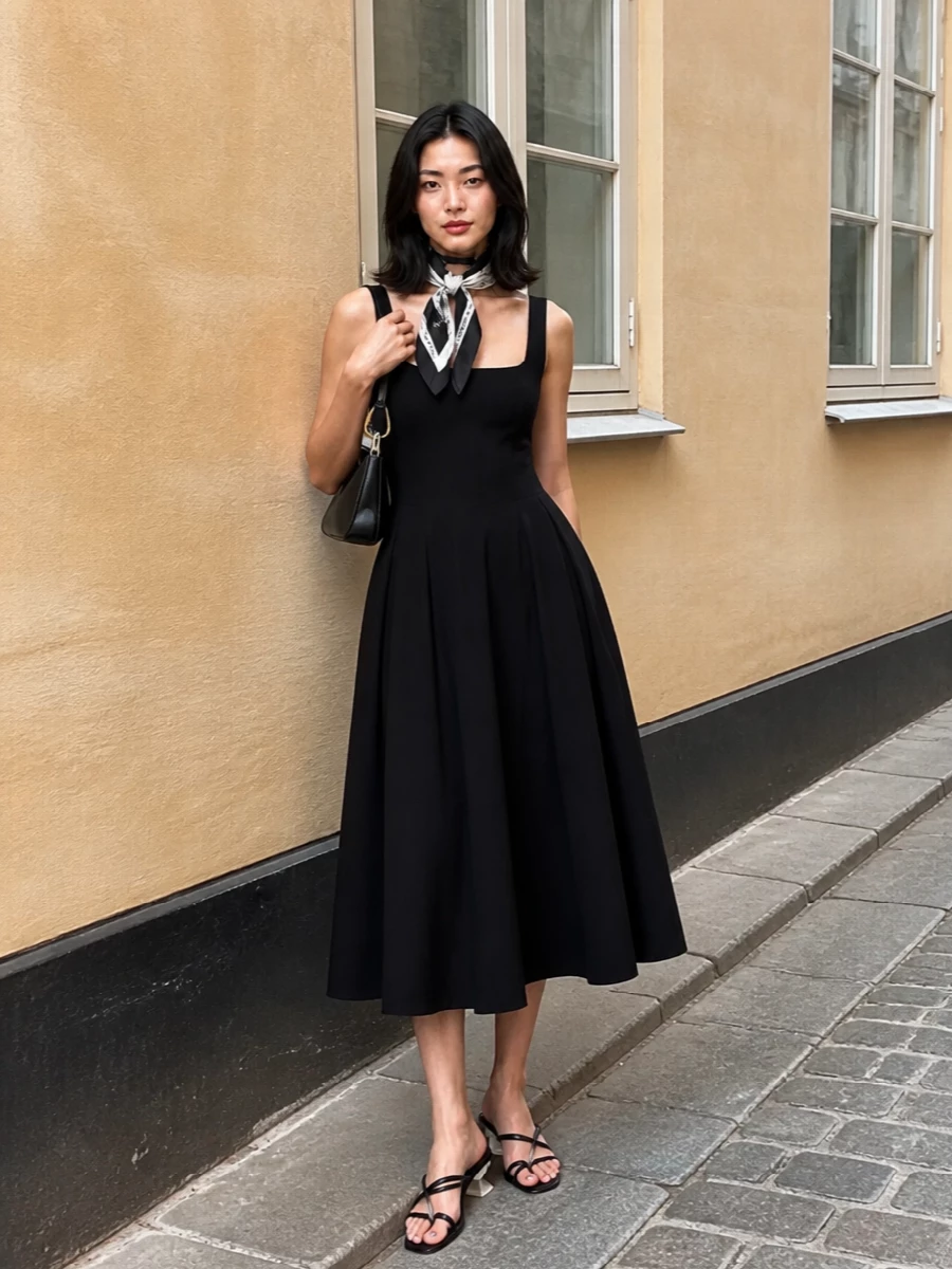 Staud black midi dress stuart weitzman sandals