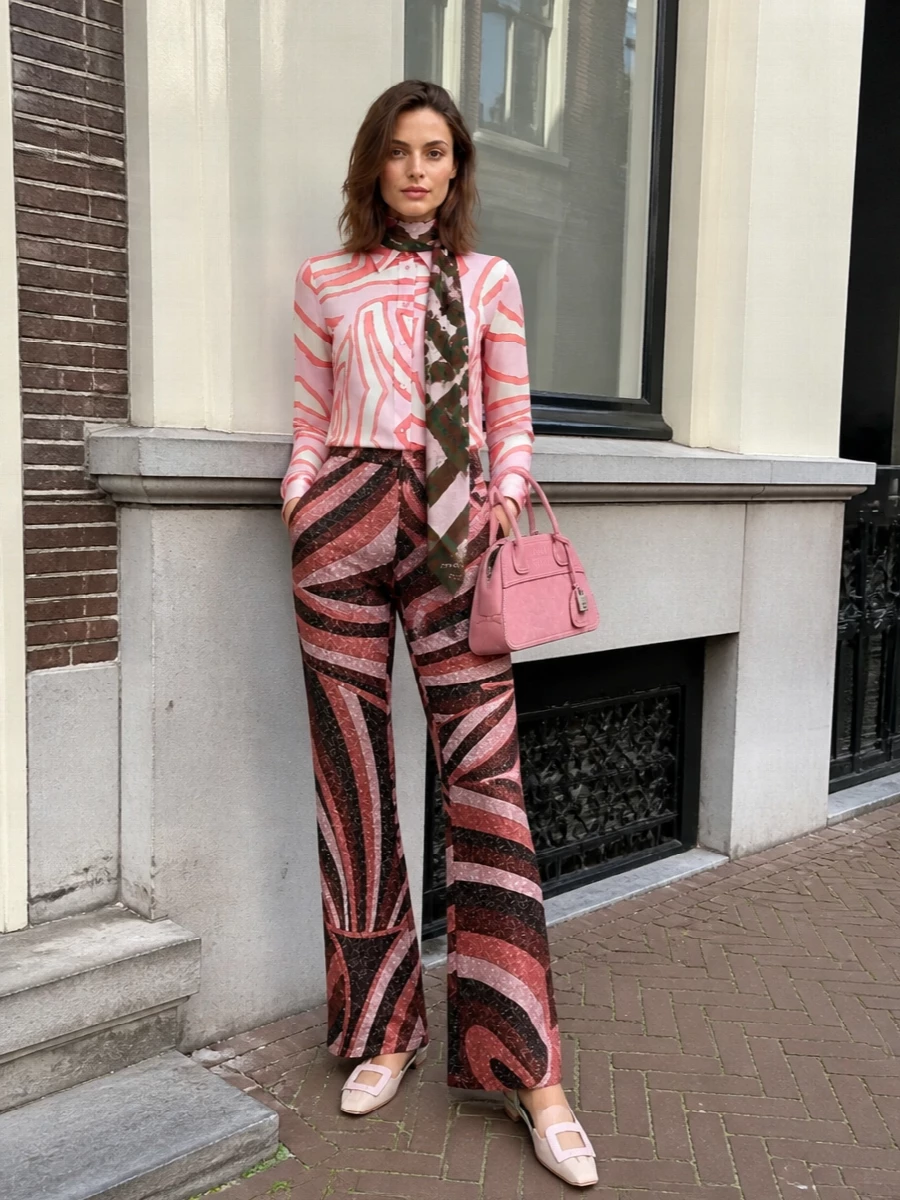 Pucci pink shirt flared trousers blush accessories