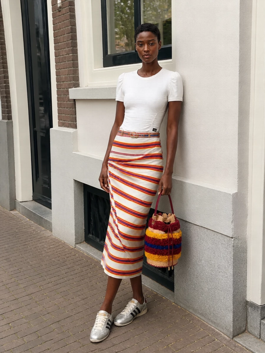 Paco rabanne striped midi skirt sneakers outfit