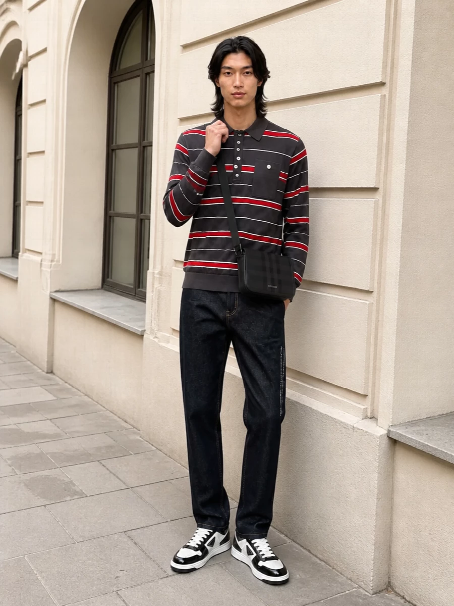 Charcoal stripes sit against crisp raw indigo for a clean, graphic take on street prep. The straight denim and polished black and white courts keep the lines sharp while the compact crossbody adds a discreet, urban finish. It is relaxed enough for daytime but reads considered from every angle.