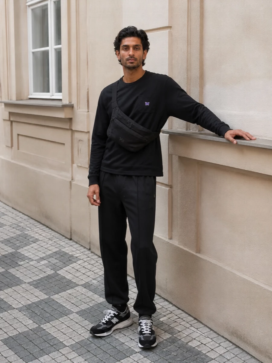 Needles track pants black new balance runners outfit