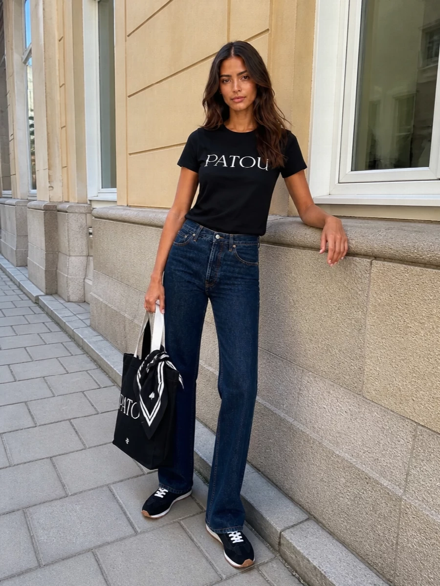 Patou logo tee toteme dark jeans outfit