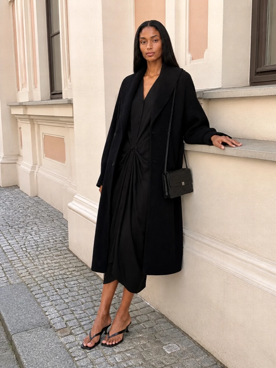 Toteme black coat draped midi dress outfit
