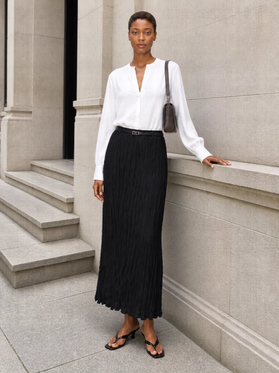 Toteme black maxi skirt white shirt outfit