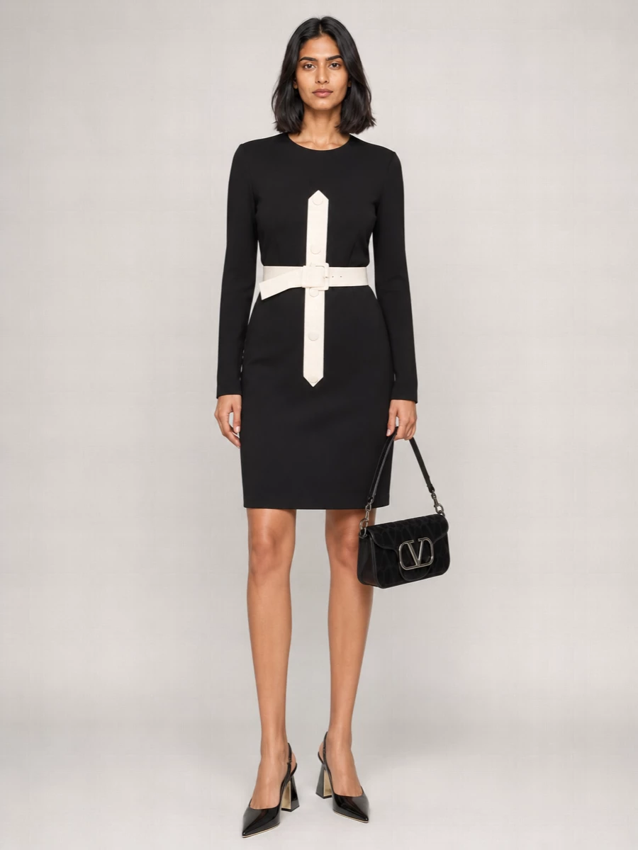 This is a precise, city-evening uniform built around graphic contrasts and disciplined lines. I chose the dress route because the Givenchy shift and the Saint Laurent belt share the same tailored, minimalist attitude, where adding separate top and trouser layers would dilute that clarity. Black patent slingbacks and a small black baguette keep the focus on cut and proportion, not decoration, for a quietly assertive finish.