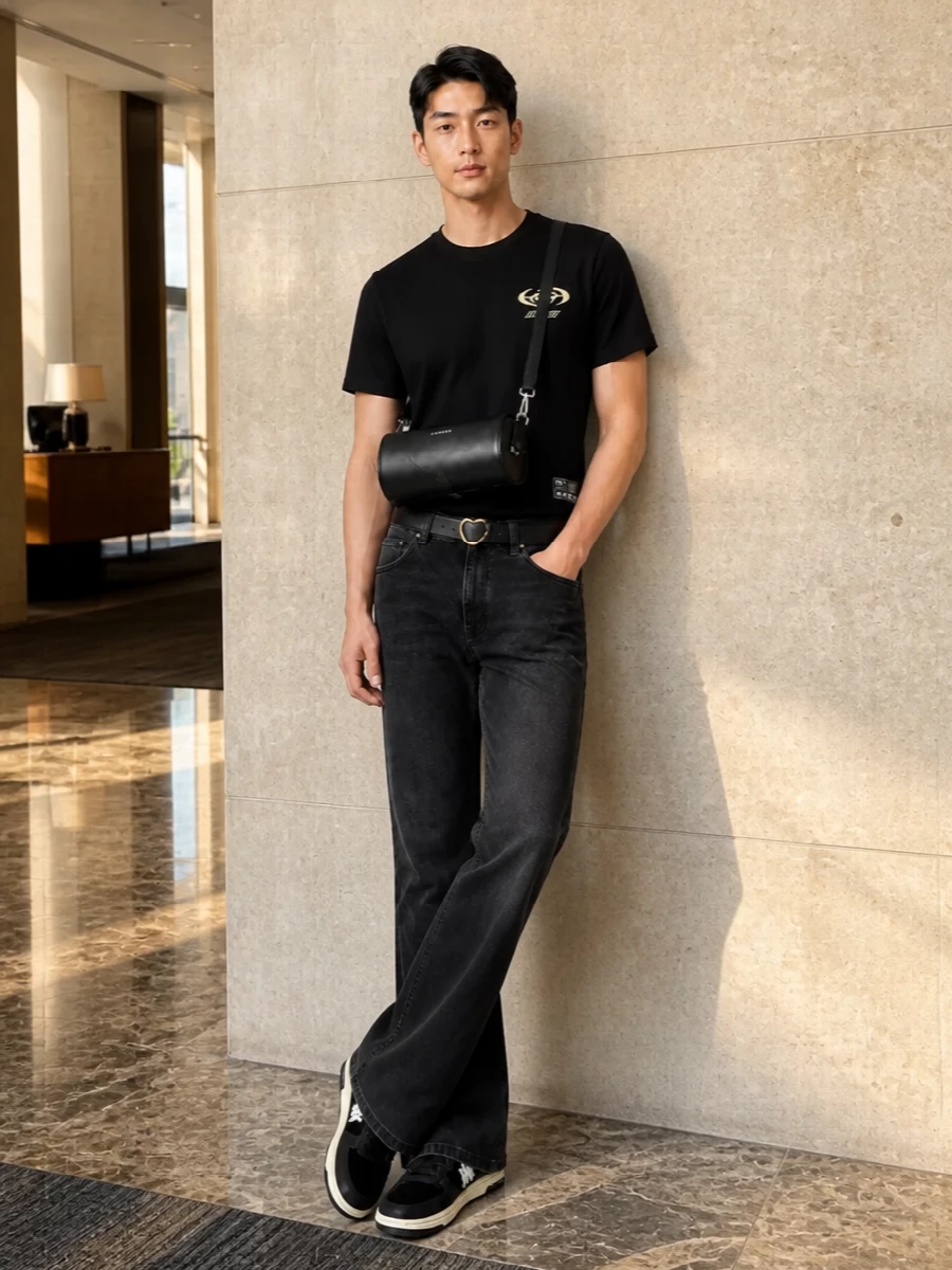 Amiri black logo tee flared jeans sneakers