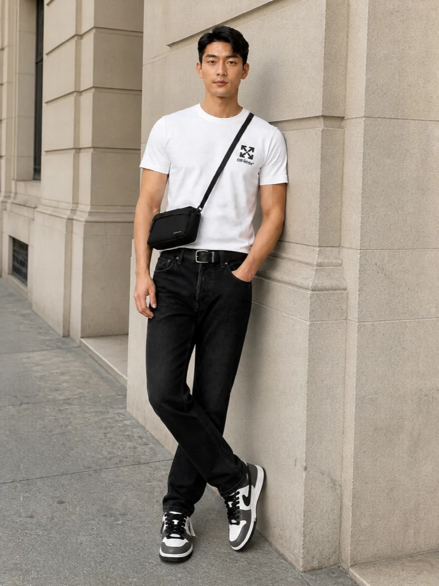 This look centres on the white Off-White tee grounded by washed-black straight-leg denim for a clean, monochrome streetwear statement. Monochrome Off-White sneakers keep the lines graphic but unfussy, while a slim black Givenchy crossbody and a refined Prada belt add just enough structure and luxury without breaking the minimalist mood. The result is an easy SS uniform that feels considered from every angle yet effortless to wear all day.