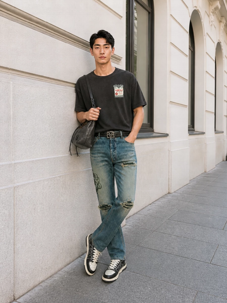 Amiri distressed jeans black tee sneakers