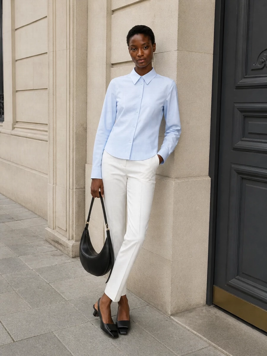 Minimalist pale blue shirt white tailored trousers