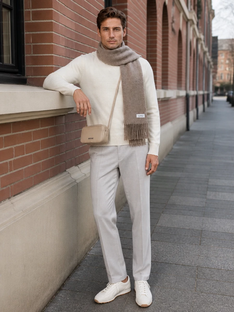 Jacquemus cream sweater stone trousers outfit