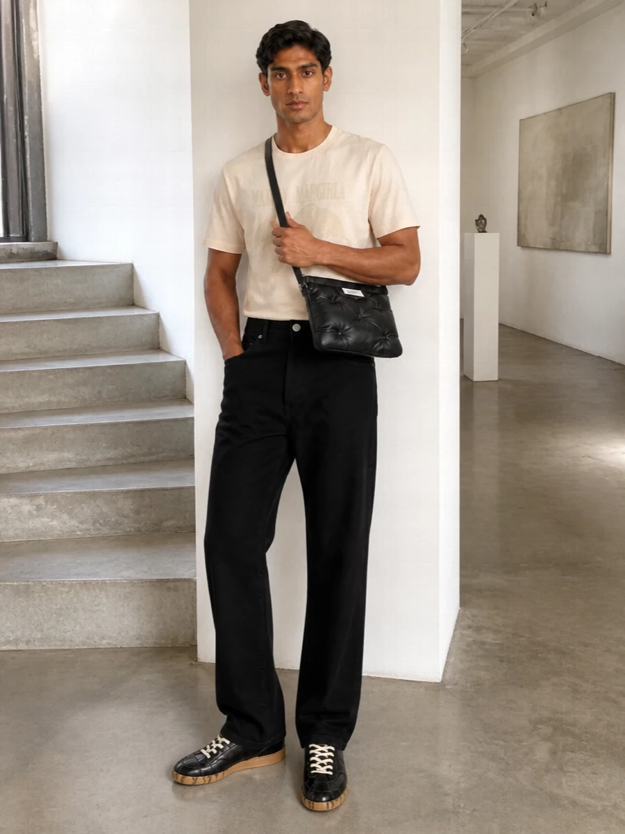 Maison margiela black sneakers black jeans outfit