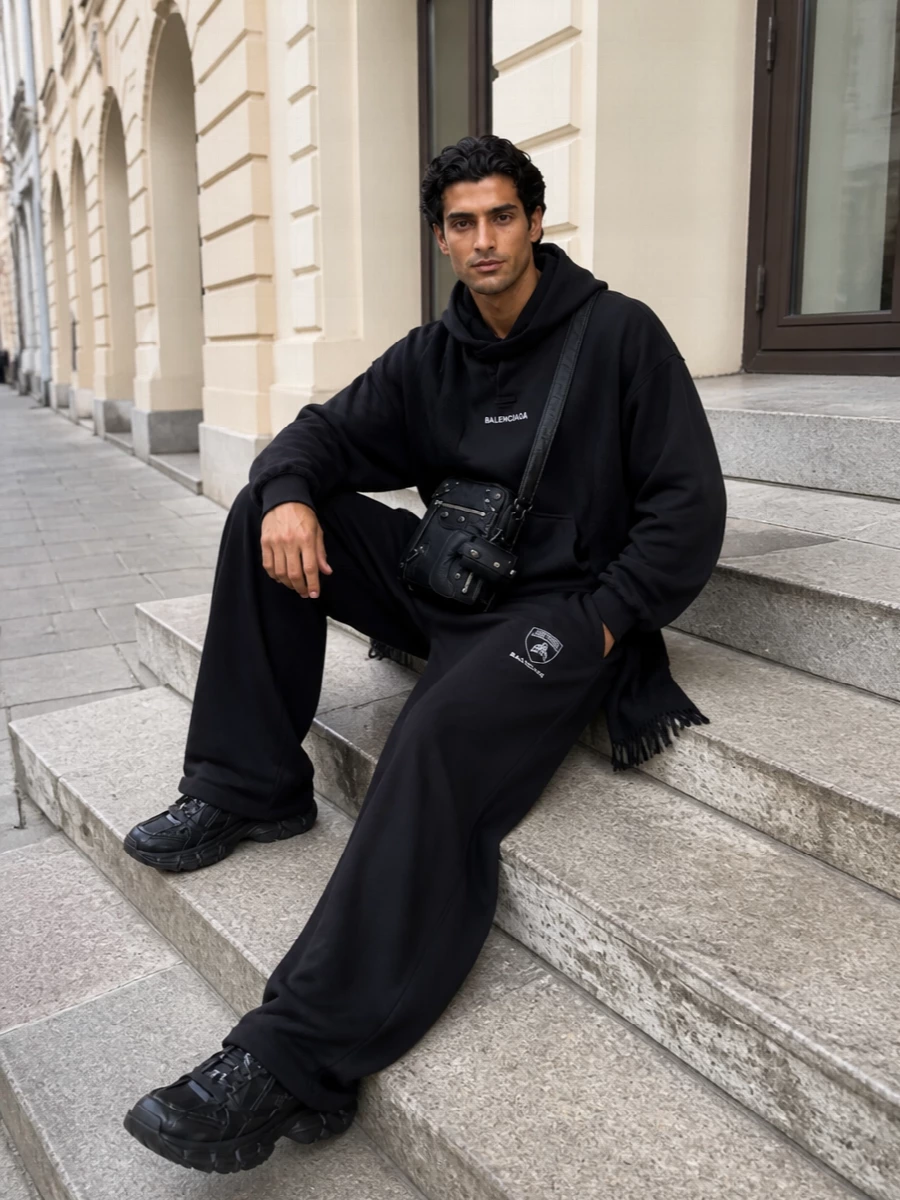 Balenciaga black hoodie wide leg pants outfit