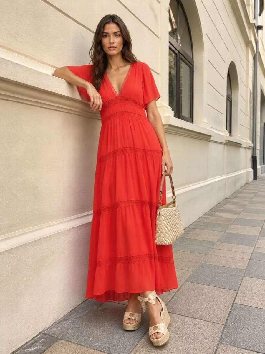 A coral Forte Forte maxi brings sun-washed movement and boho romance to the structured Etro bag’s quiet Riviera polish. Cream espadrille wedges pick up the bag’s woven texture and warm neutrals, keeping the silhouette long and easy while still dressy enough for summer lunches that slide into cocktails. Choosing the dress path keeps the focus on one flowing statement piece that harmonises with the bag’s artisanal detail instead of breaking the line with separates.