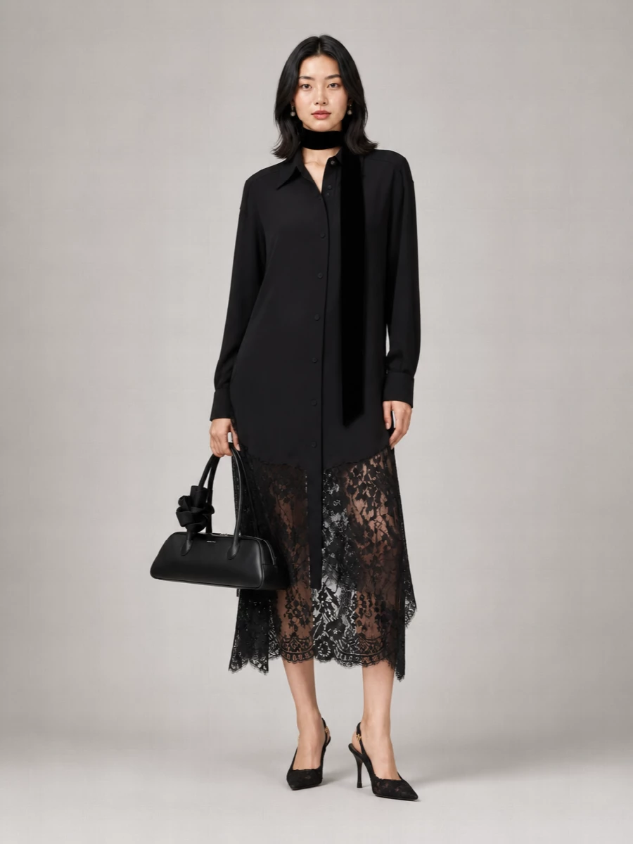 A study in black romance, this pairing lets the lace shirt dress stay center stage, framed by equally refined lace heels and a sculptural rose-handled bag. The mix of textures, from sheer panels to velvet and smooth leather, creates depth within a single tone so the effect is dramatic but still restrained. Gold touches and pearl studs add just enough light to feel considered for evening without softening the dress’s graphic edge.