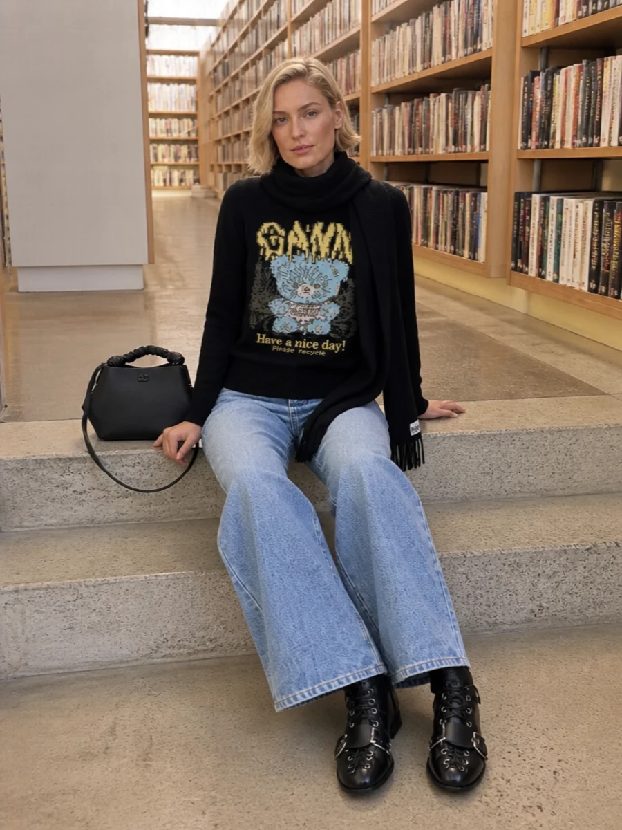 Ganni graphic sweater wide leg jeans boots