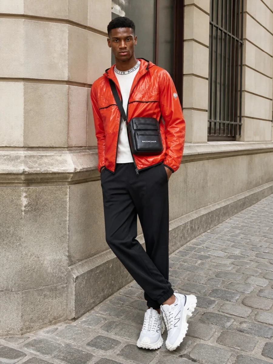 Moncler orange windbreaker track pants outfit