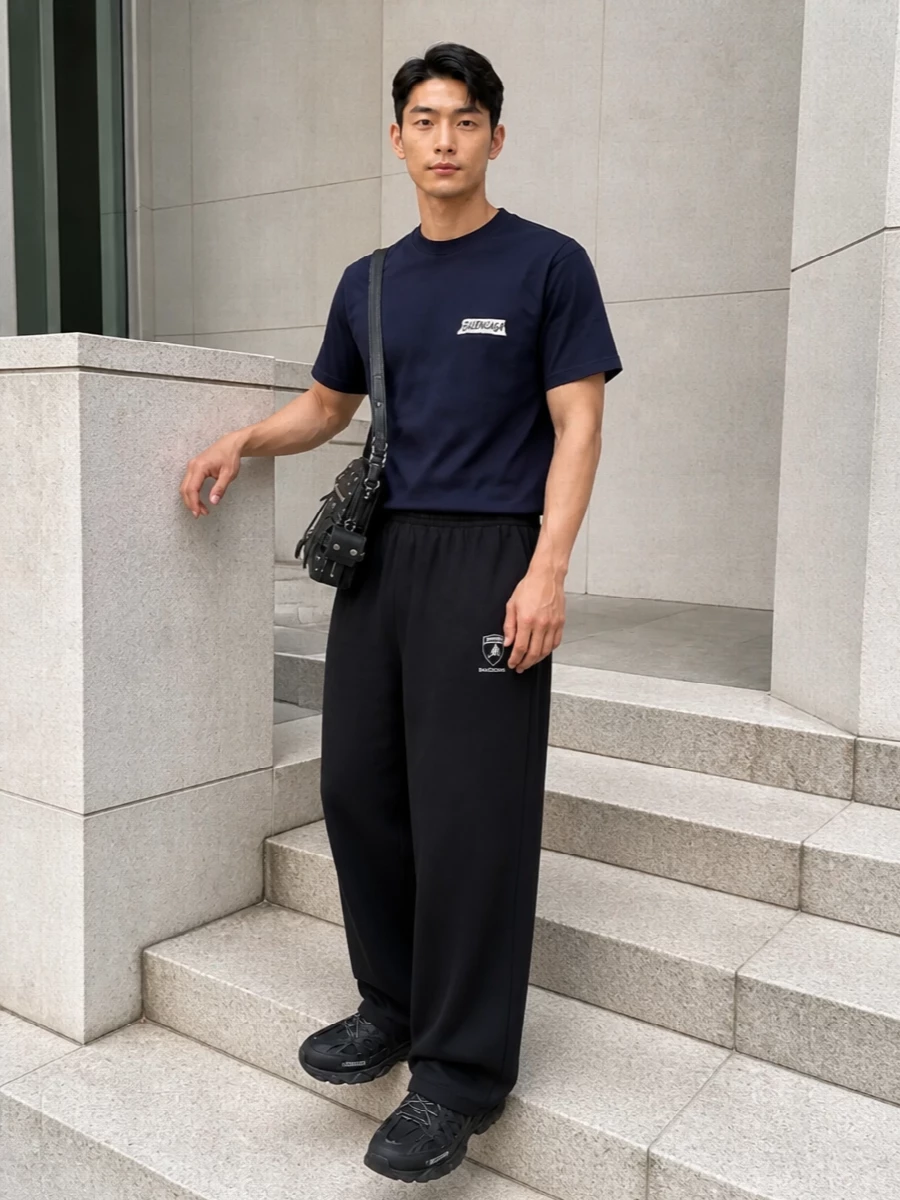 Balenciaga navy tee black wide leg pants outfit