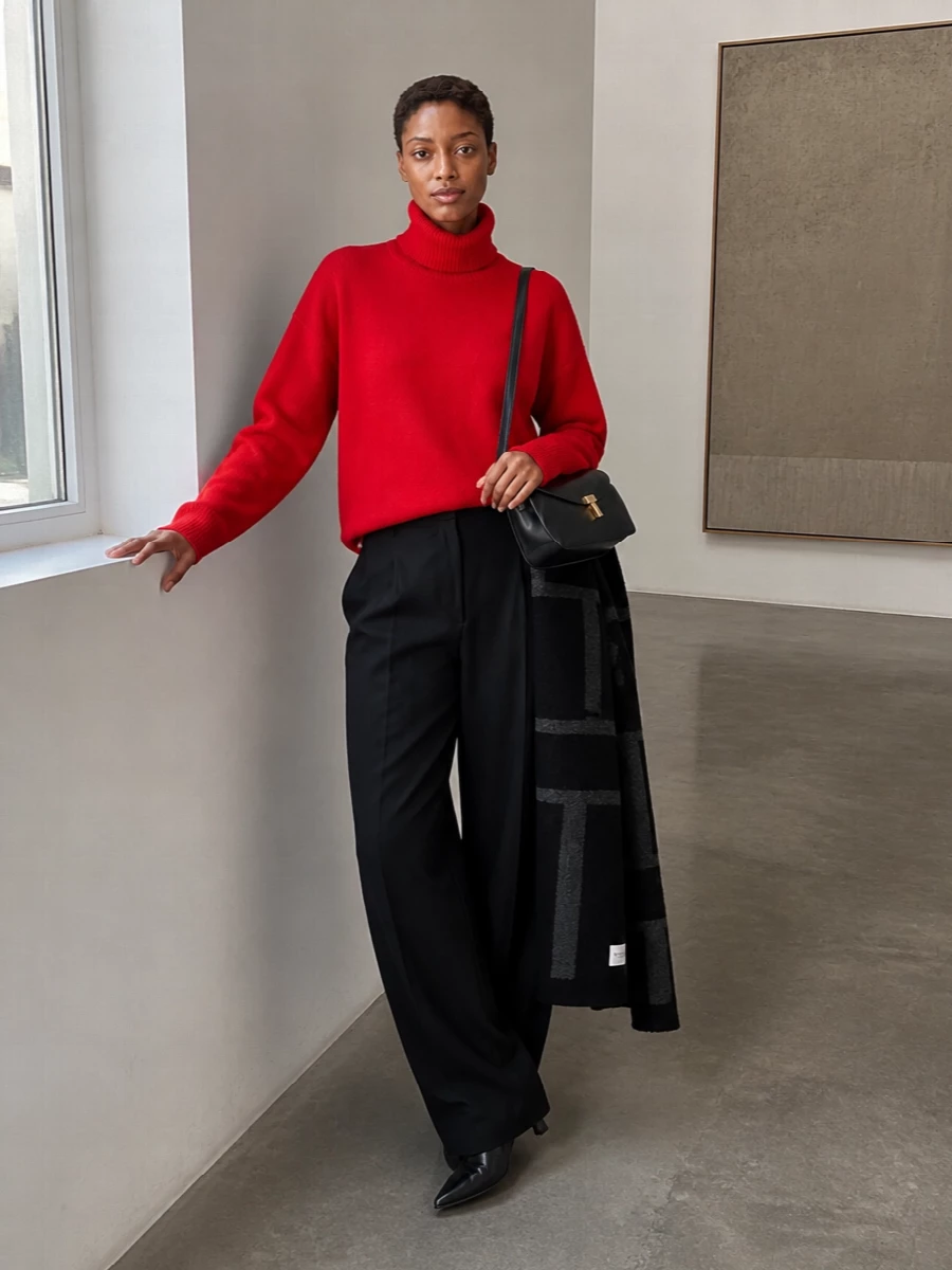 Toteme red turtleneck black wide leg trousers