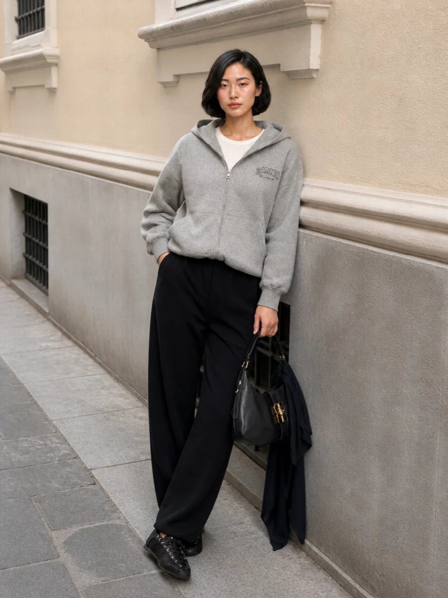 Ganni wide leg pants grey hoodie black sneakers