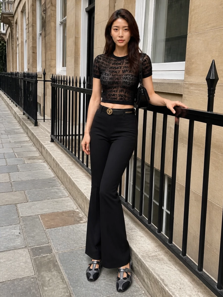 Versace mesh top black flared trousers outfit
