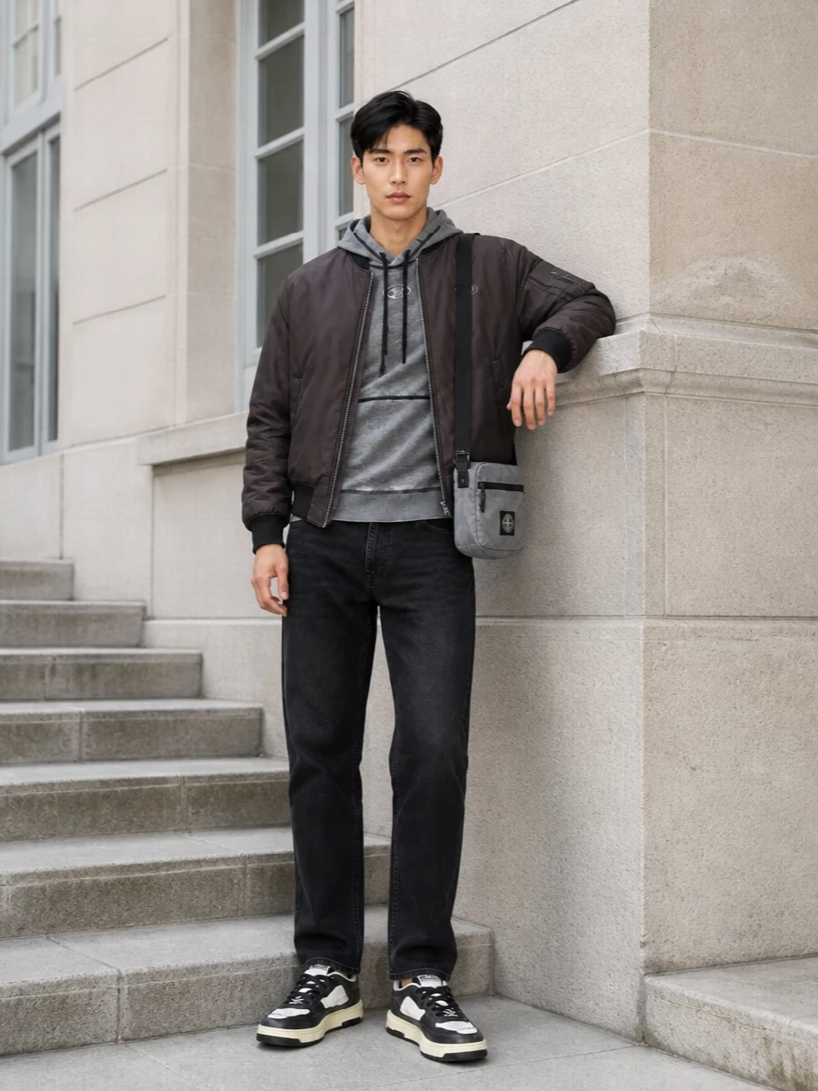 Charcoal and washed greys run through the bomber, hoodie and denim, giving a tight, urban palette with just enough contrast from the sneakers and bag. Everything sits in a relaxed regular cut, so the volume reads intentional rather than sloppy, ideal for city days and late-night runs. The mix of Diesel with a small hit of Stone Island branding keeps it firmly in modern streetwear without feeling logo-heavy.