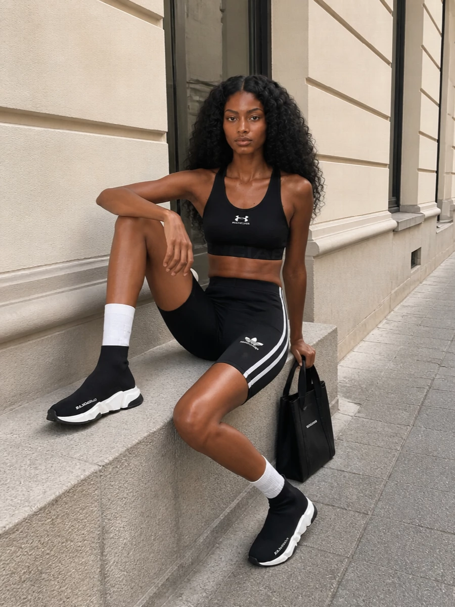 Balenciaga black sports bra bike shorts outfit