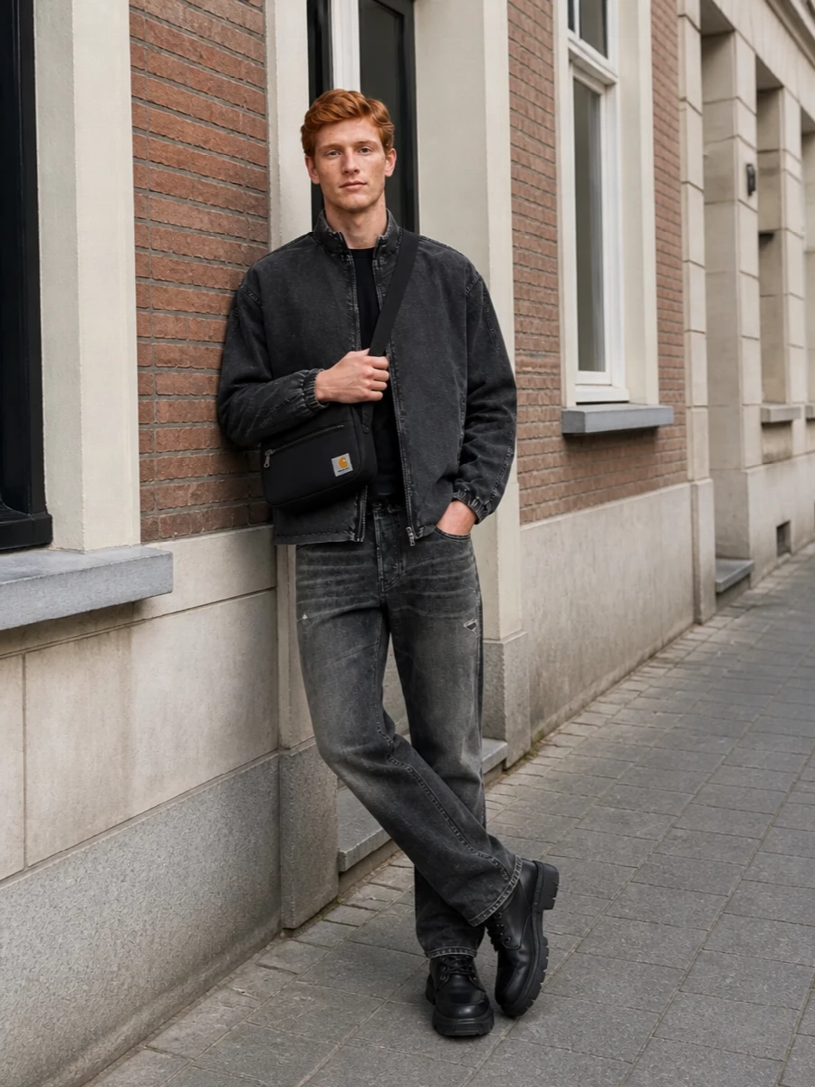 Washed charcoal on black keeps this Diesel-centered outfit tight and gritty, all about texture rather than color. The straight-leg charcoal denim and chunky lace-up boots ground the regular-cut jacket and sweatshirt, while the compact crossbody adds just enough street utility without breaking the monochrome flow. It is built for cold urban days where you want everything relaxed, considered and ready to move.