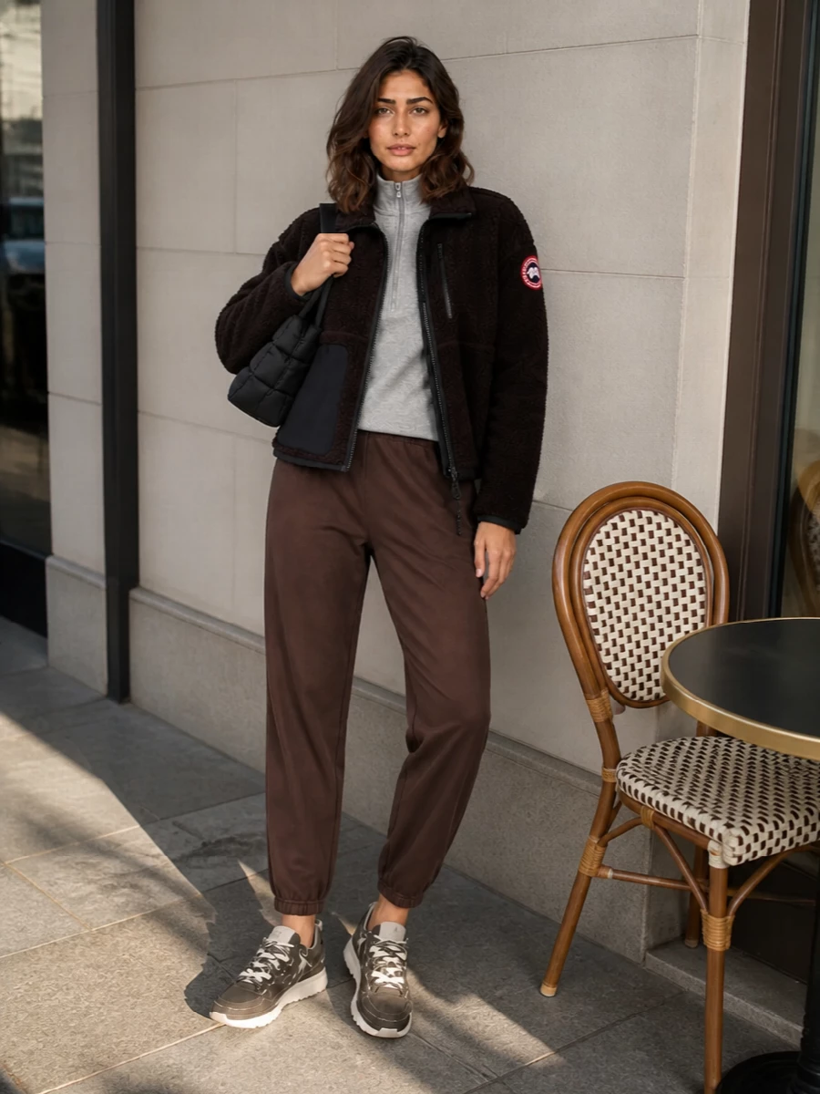 Canada goose shearling jacket track pants outfit