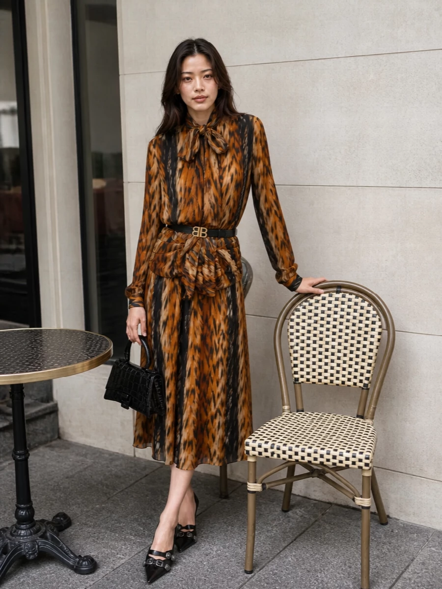Balenciaga animal print dress black heels bag