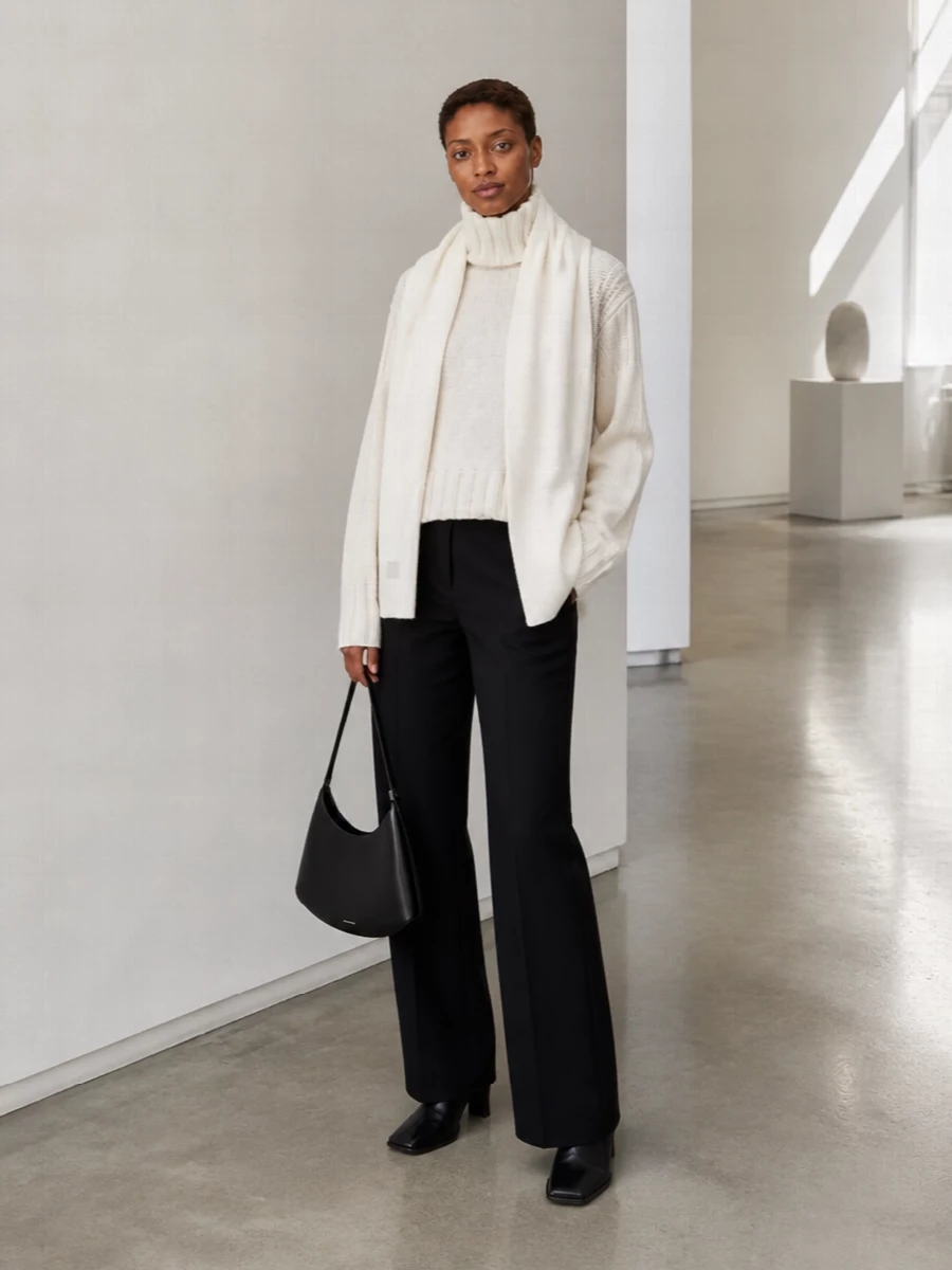 Jil sander ivory turtleneck black wide leg trousers