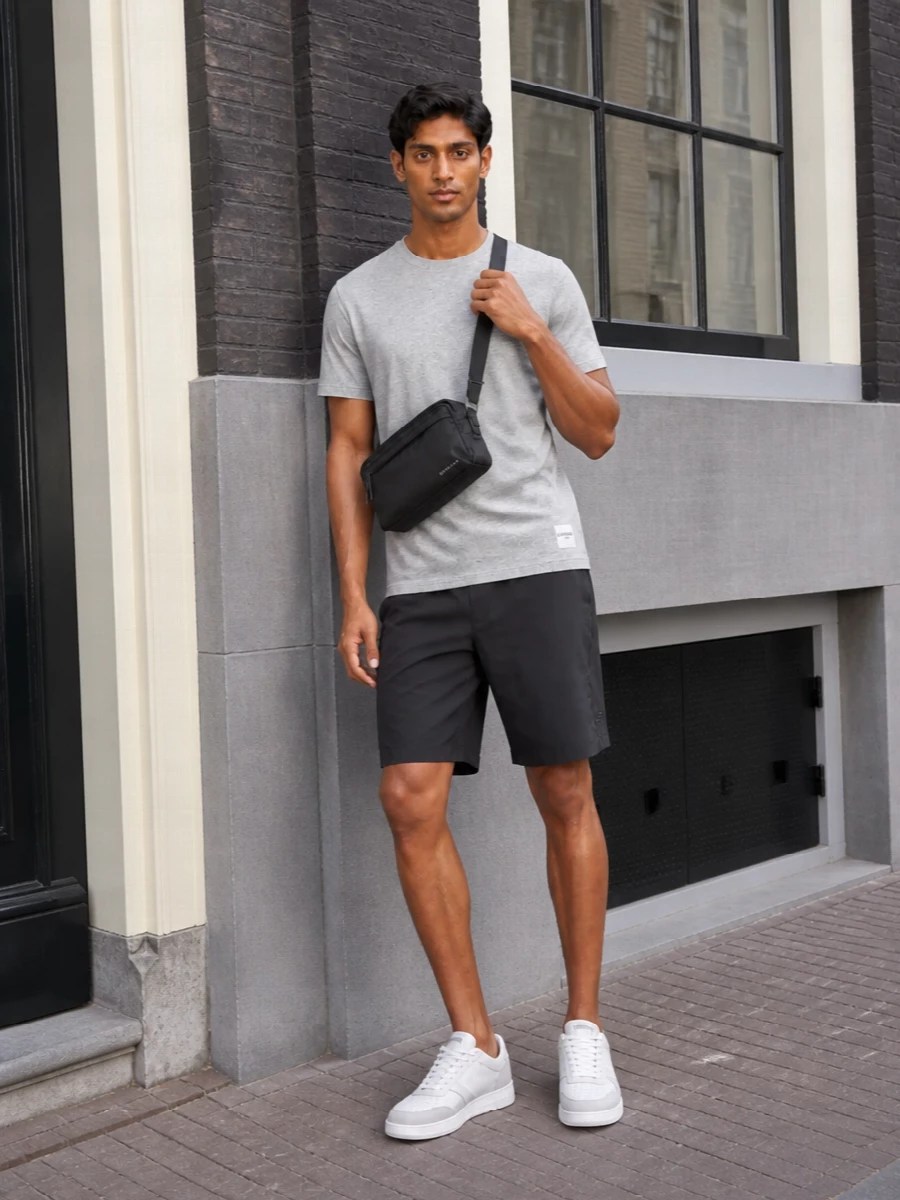 Givenchy grey tee charcoal shorts white sneakers