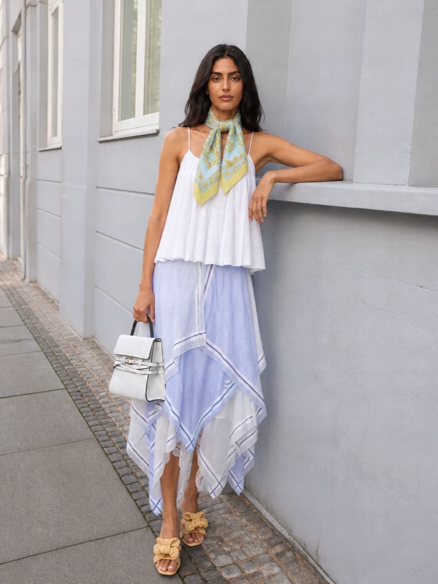 Moschino asymmetric midi skirt white top outfit