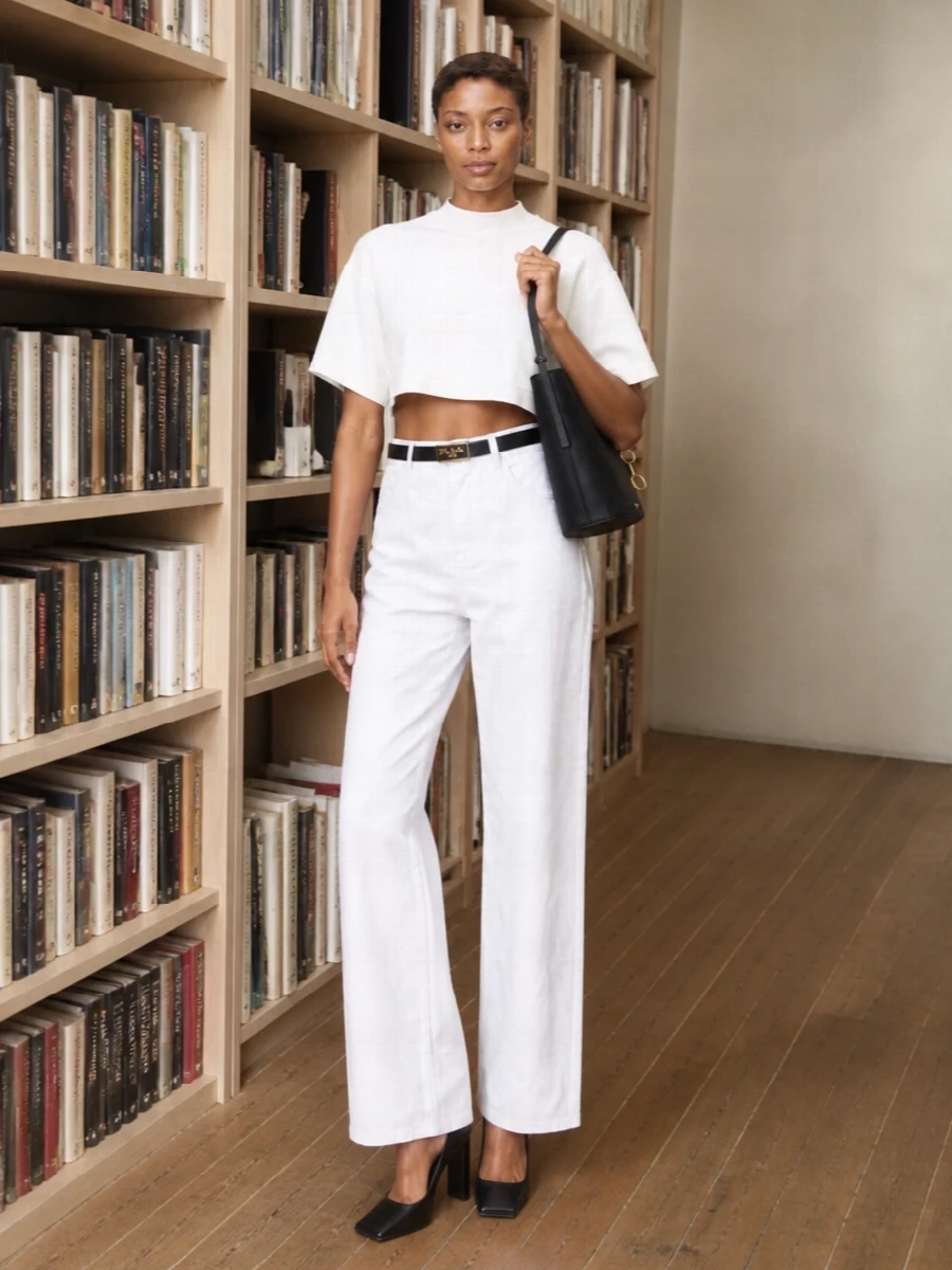 Alaia white wide leg jeans ivory knit pumps