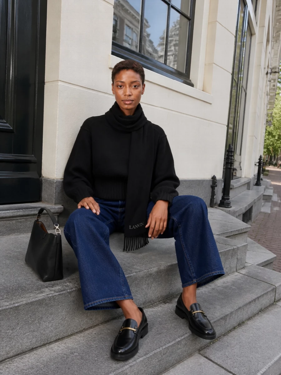 Loulou studio black sweater wide leg jeans outfit