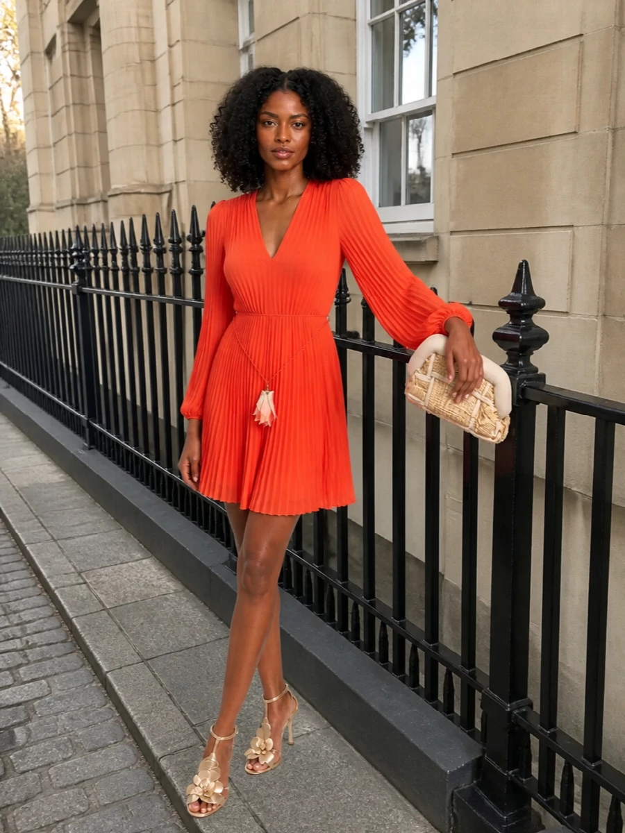 Zimmermann coral mini dress gold heels clutch