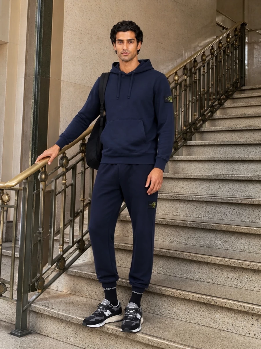 Stone island navy track pants tech sneakers outfit