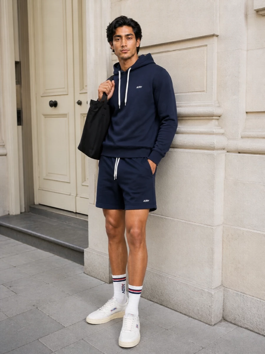 Autry navy hoodie shorts outfit white sneakers