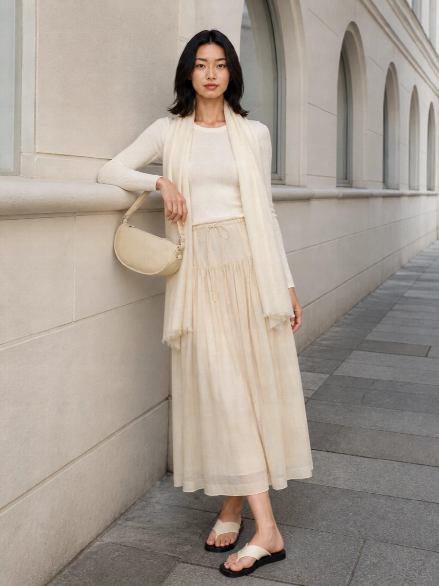 The row buttercream midi skirt ivory knit outfit