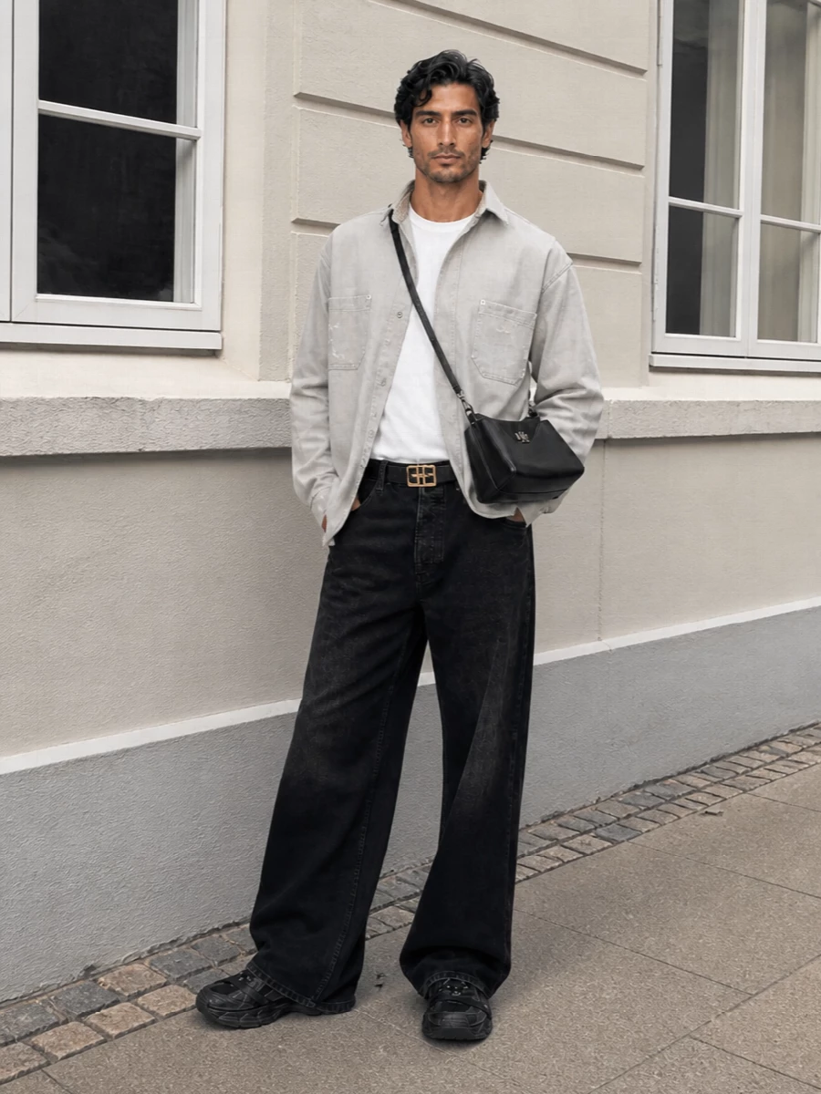 Balenciaga stone shirt black wide leg jeans outfit