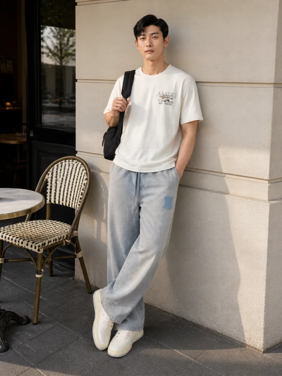 Amiri sneakers wide leg pants tee outfit