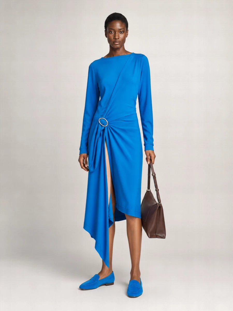 The cobalt Attico dress and Dries Van Noten loafers create a confident monochrome story that feels modern and quietly dramatic rather than loud. The sculpted wrap line keeps the body long and clean, while the chocolate Wandler shoulder bag adds a grounded, luxurious counterpoint to all that blue. I chose the dress path so the shoes can play into a strong single-color narrative instead of fighting with additional tailoring separates on top and bottom.