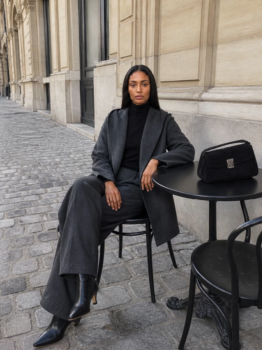 Toteme charcoal coat black turtleneck wide trousers