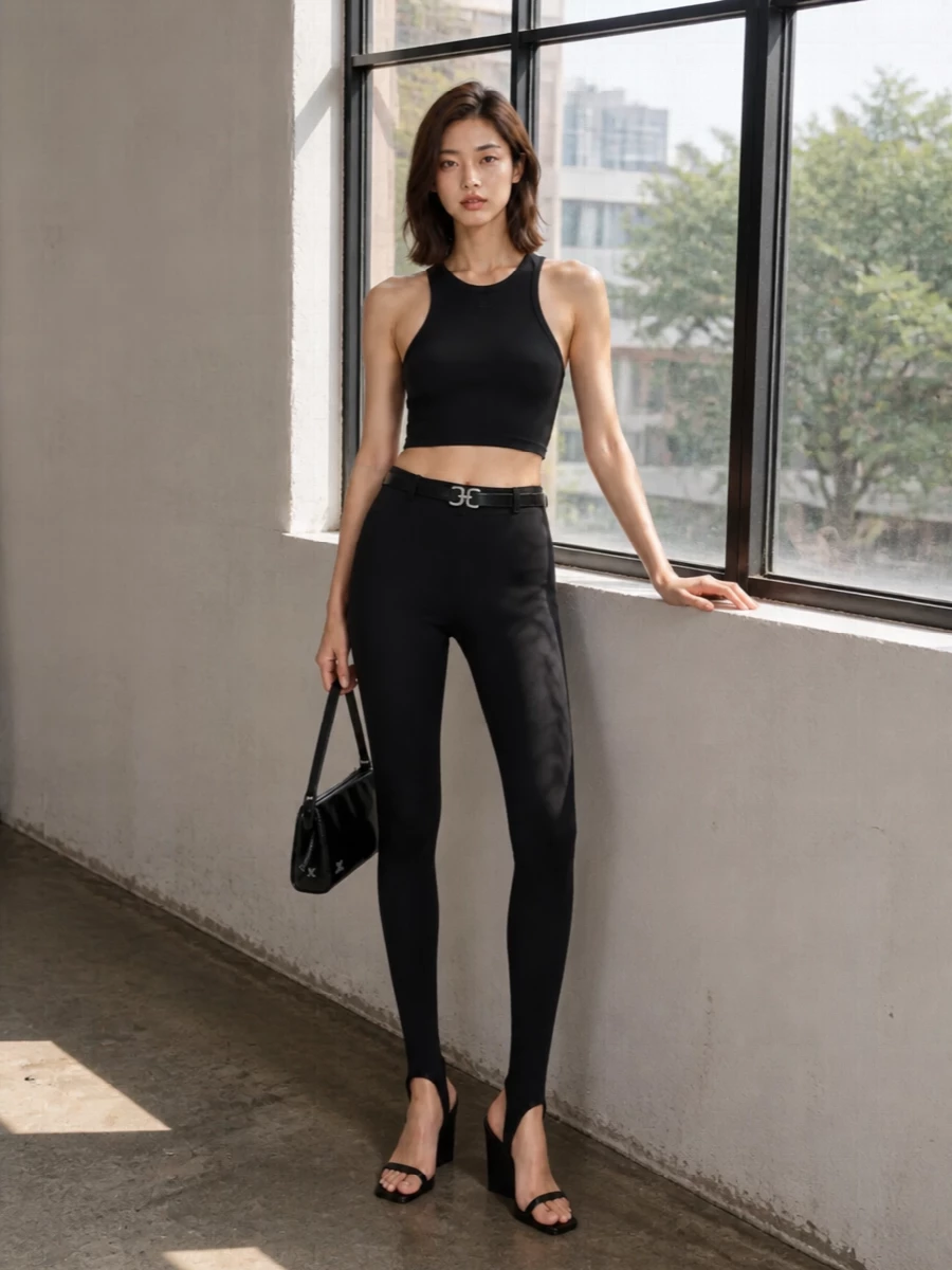Courreges black stirrup leggings racerback outfit